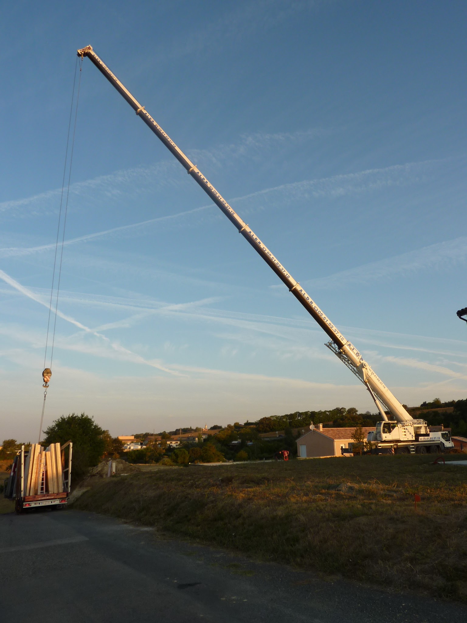 Grue panneau maison bois